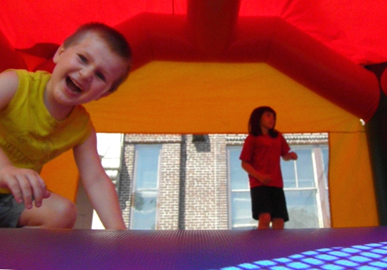 two children bounce house